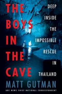 Cover image for The boys in the cave : : deep inside the impossible rescue in Thailand